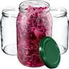 Three glass jars, one filled with red cabbage, and a green lid. Podgląd zdjęcia produktu