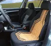 Interior of a car with a beaded seat cover on the driver's seat. Produktbild-Vorschau