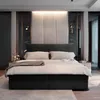A modern bedroom with a large bed as the focal point. Produktbild-Vorschau