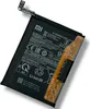 A black smartphone battery with an orange connector ribbon, isolated on a white background. Produktbild-Vorschau