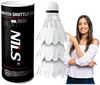 A product shot of badminton shuttlecocks and their packaging, with a woman pointing to the shuttlecocks. Voir les images du produit