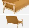 A two-part image showing a mustard yellow sofa with wooden legs and armrests, viewed from the front-left and rear-left. Anteprima dell’immagine prodotto