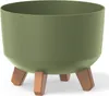 A green planter with brown legs on a white background. Náhled obrázku produktu