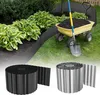 A garden scene showing a flower bed with a metal border, a wheelbarrow filled with soil, and a shovel. Two rolls of the metal border are shown in the foreground. Produktbild-Vorschau
