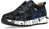 A single blue sneaker with a floral pattern and a white sole with text is shown against a white background. Produktbild-Vorschau