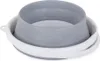 A collapsible bucket or bowl, partially folded. Anteprima dell’immagine prodotto