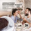 A couple is enjoying coffee in a bright, airy room, with a close-up of coffee beans and a coffee machine dial in the foreground. Náhľad obrázku produktu