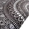 A close-up view of a black and white mandala pattern on a soft surface, likely a rug or blanket. Produktbild-Vorschau