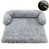 A fluffy gray dog bed with raised sides, presented on a white background. Produktbild-Vorschau