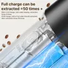 Close-up of a portable coffee machine with text overlay highlighting its features and battery power. Náhled obrázku produktu