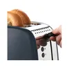 A close-up shot of a person's hand adjusting the dial on a gray toaster with two slices of bread inside. Voir les images du produit