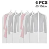A set of six garment bags containing clothes. Produktbild-Vorschau