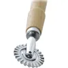 A close-up shot of a pastry wheel with a wooden handle. Produktbild-Vorschau