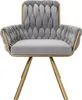 A single gray upholstered chair with gold metal legs against a white background. Produktbild-Vorschau