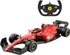 A red remote-controlled Formula 1 car and its steering wheel controller are displayed against a white background. Podgląd zdjęcia produktu
