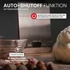 A digital kitchen scale is shown with text overlays highlighting its auto-shutoff feature and a countdown timer. Ingredients like nuts and dough are visible in the foreground and background. Produktbild-Vorschau