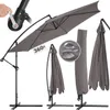 A collage of images showing a gray cantilever umbrella in various states: open, closed, and with a cover. It also highlights a crank mechanism and water-repellent fabric. Náhled obrázku produktu