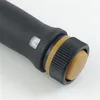 A close-up view of the handle of a torque wrench, showing a digital display and a rotating knob. Produktbild-Vorschau