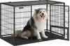 A large dog sits inside a black metal dog crate with the doors open. Produktbild-Vorschau
