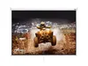 A projection screen displaying an action shot of a person riding an ATV through mud. Náhled obrázku produktu