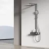 A modern bathroom shower system mounted on a light gray wall, with a minimalist background. Anteprima dell’immagine prodotto