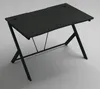 A black computer gaming desk with a textured surface and metal legs, shown from a slightly elevated angle against a light gray background. Podgląd zdjęcia produktu