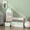 A children's storage bench with shelves shaped like a house, with a gray cushion, and two mint green storage boxes underneath. A large stuffed Totoro toy is on the right. Podgląd zdjęcia produktu