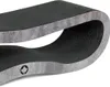 A close-up view of a curved, textured object with a metallic-looking edge and a small leaf logo. Voir les images du produit