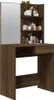 A vanity table with a mirror and shelves filled with various cosmetic products. Náhled obrázku produktu