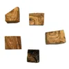 Five pieces of unfinished olive wood are arranged on a white background. Produktbild-Vorschau