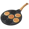 A waffle pan with several waffles cooked in it, set against a white background. Produktbild-Vorschau