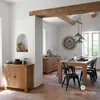 A dining room with a wooden table and chairs, a sideboard, and a large wall clock. Náhľad obrázku produktu