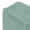 A close-up view of the corner of a green plastic trash can lid. Náhľad obrázku produktu