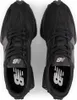 A top-down view of a pair of black New Balance sneakers. Anteprima dell’immagine prodotto