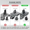 Comparison of Dyson V11 and V12 vacuum cleaner batteries, showing compatibility and incompatibility. Anteprima dell’immagine prodotto