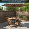 A patio set with a table, chairs, and an umbrella on a wooden deck. Podgląd zdjęcia produktu