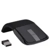 A black wireless arc touch mouse and its USB receiver are shown against a white background. Náhľad obrázku produktu