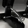 A close-up view of a mechanical component with a spring and metal rod. Produktbild-Vorschau