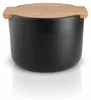 A black ceramic salt cellar with a wooden lid sits on a white reflective surface. Produktbild-Vorschau