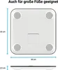 A top-down and side view of a white digital scale, with dimensions indicated by blue lines and text. Produktbild-Vorschau