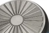 Close-up view of the bottom of a frying pan, showing its textured surface and a central logo. Náhľad obrázku produktu