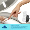 A close-up of a hand and a baby's hand touching a soft surface, with a detail of a non-slip pad. Produktbild-Vorschau
