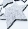 Several grey felt stars are arranged on a white background. Produktbild-Vorschau