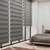 A bedroom scene with a bed and blinds. Voir les images du produit