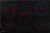 A top-down view of a black glass ceramic cooktop with five heating zones, each labeled with its wattage. Náhled obrázku produktu
