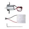 A motor and a thermoelectric cooler module with wires and a connector, along with an Allen wrench, are laid out on a white background. Voir les images du produit
