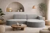 A modern living room scene featuring a sectional sofa, coffee table, and floor lamp. Produktbild-Vorschau
