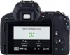The back view of a black Canon EOS 200D camera with its LCD screen displaying the 'Scene Intelligent Auto' mode. Produktbild-Vorschau