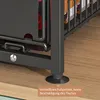 Close-up of the adjustable foot of a gray organizer unit resting on a wooden surface. Produktbild-Vorschau