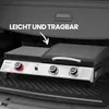 A portable gas grill is placed in the trunk of a car. Produktbild-Vorschau